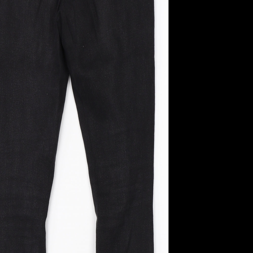 Brand and care label for Boohoo women’s black cotton skinny jeans, size UK 12, 24-inch leg regular