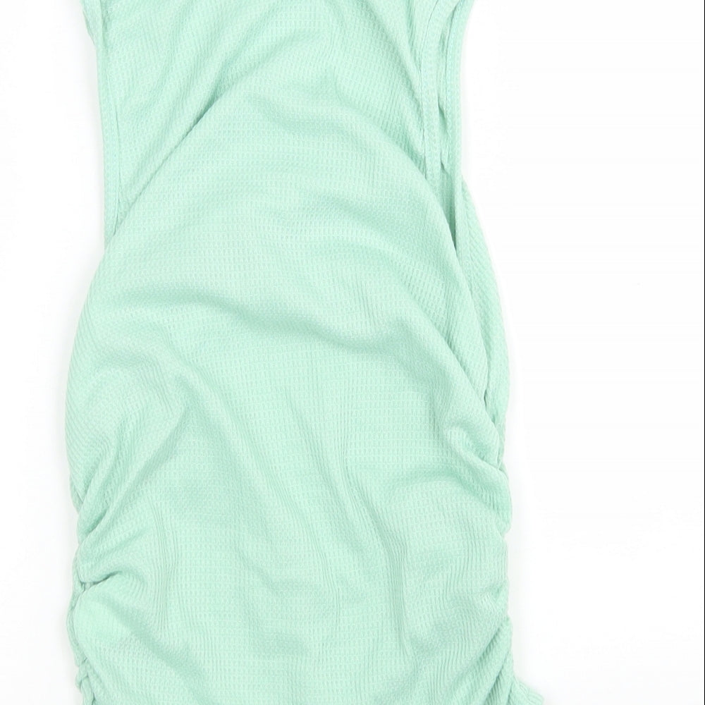 Brand and care label for SHEIN women’s green round neck polyester vest jumper, size M