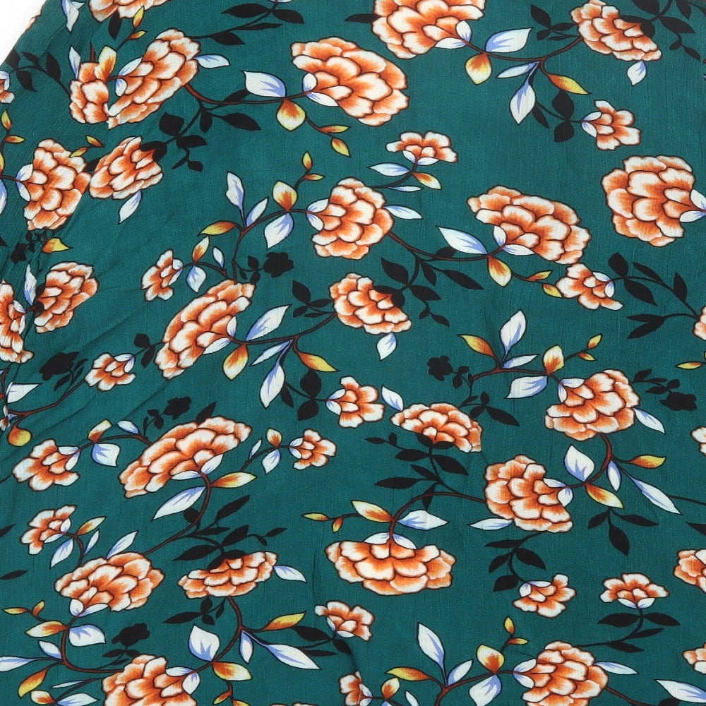 Brand and care label for Boohoo women’s green v-neck floral viscose shrug jumper, size UK 8