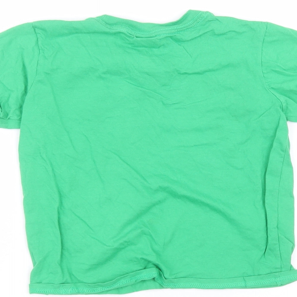 Brand and care label for Gilden boys’ green cotton basic t-shirt, size S, round neck