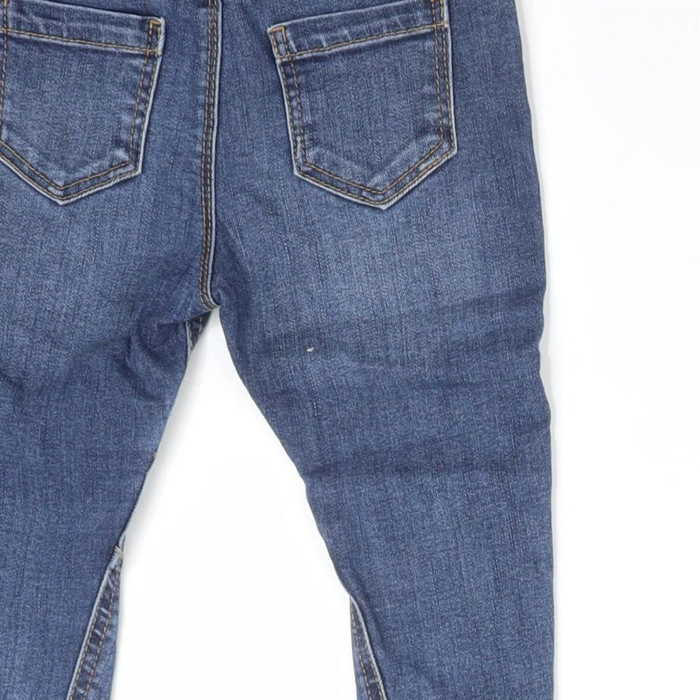 Brand and care label for George boys’ blue cotton jeans, size 12-18, months