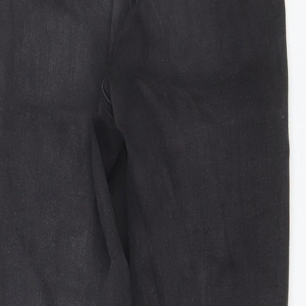 Brand and care label for Missguided women’s black cotton skinny jeans, size UK 8, 25-inch leg regular