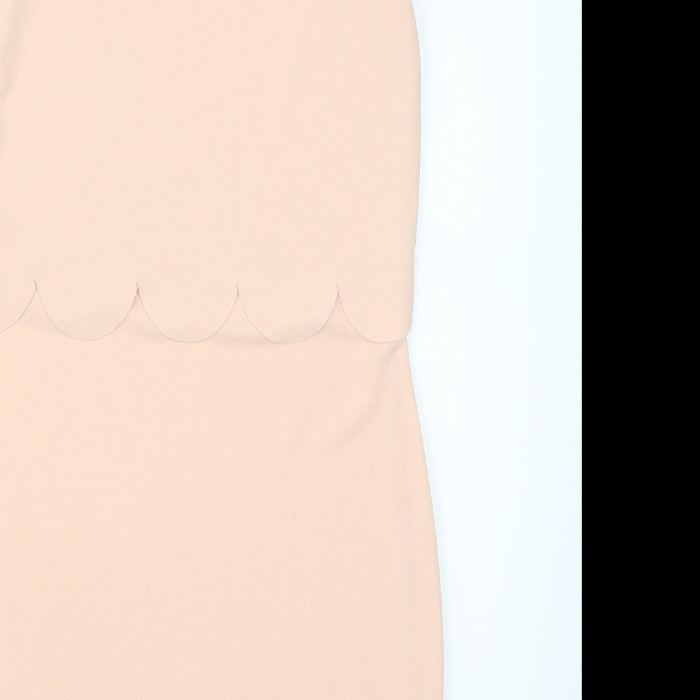 Brand and care label for Boohoo women’s pink polyester pencil dress, size UK 10, round neck