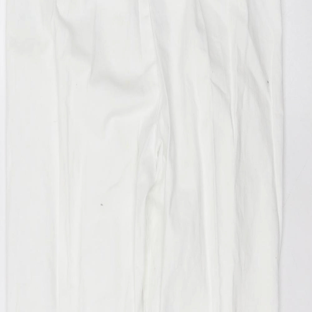 Brand and care label for Being Casual women’s white cotton trousers, size UK 22, 27-inch leg regular