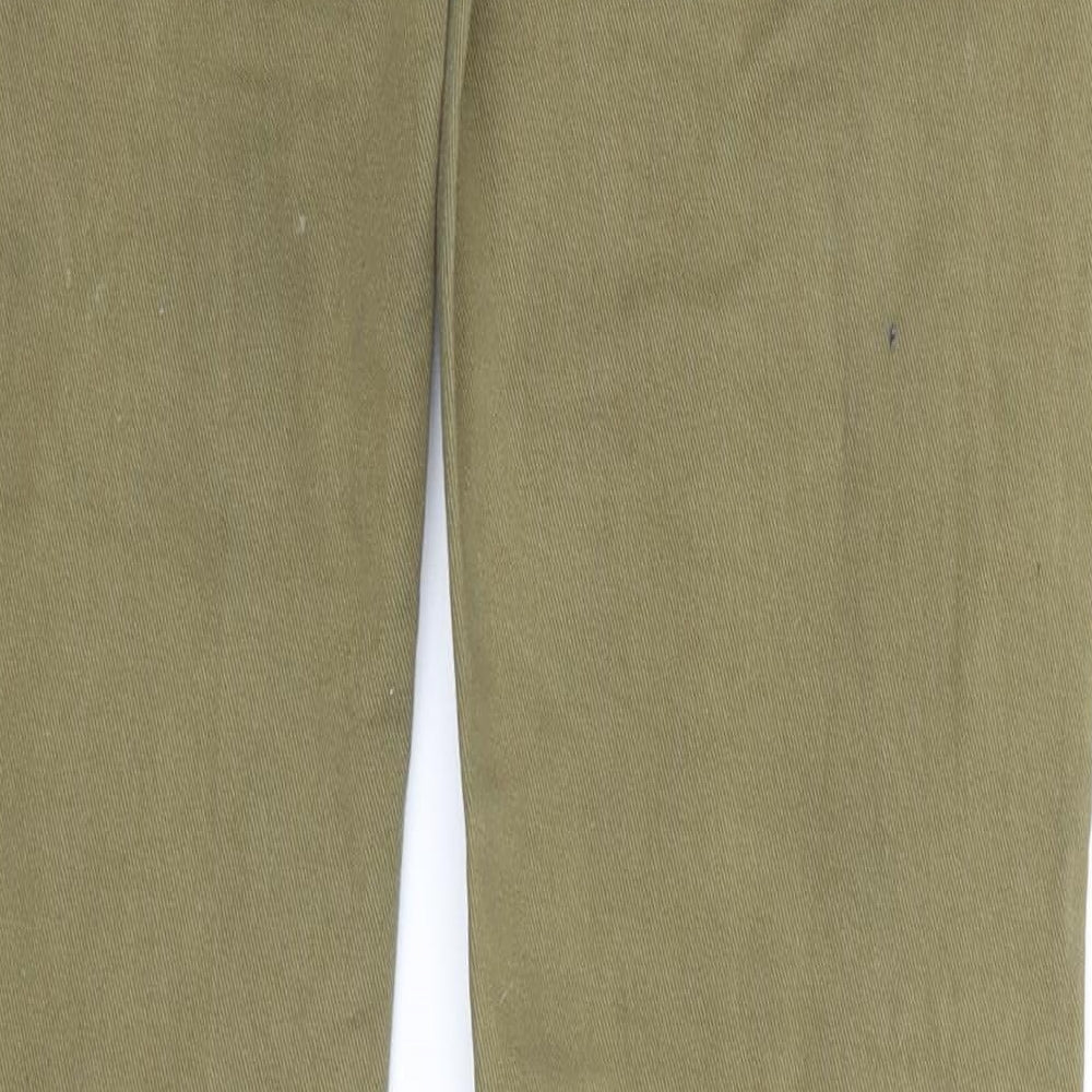 Brand and care label for Denim & Co. men’s green cotton skinny jeans, size 30, in, 32-inch leg regular