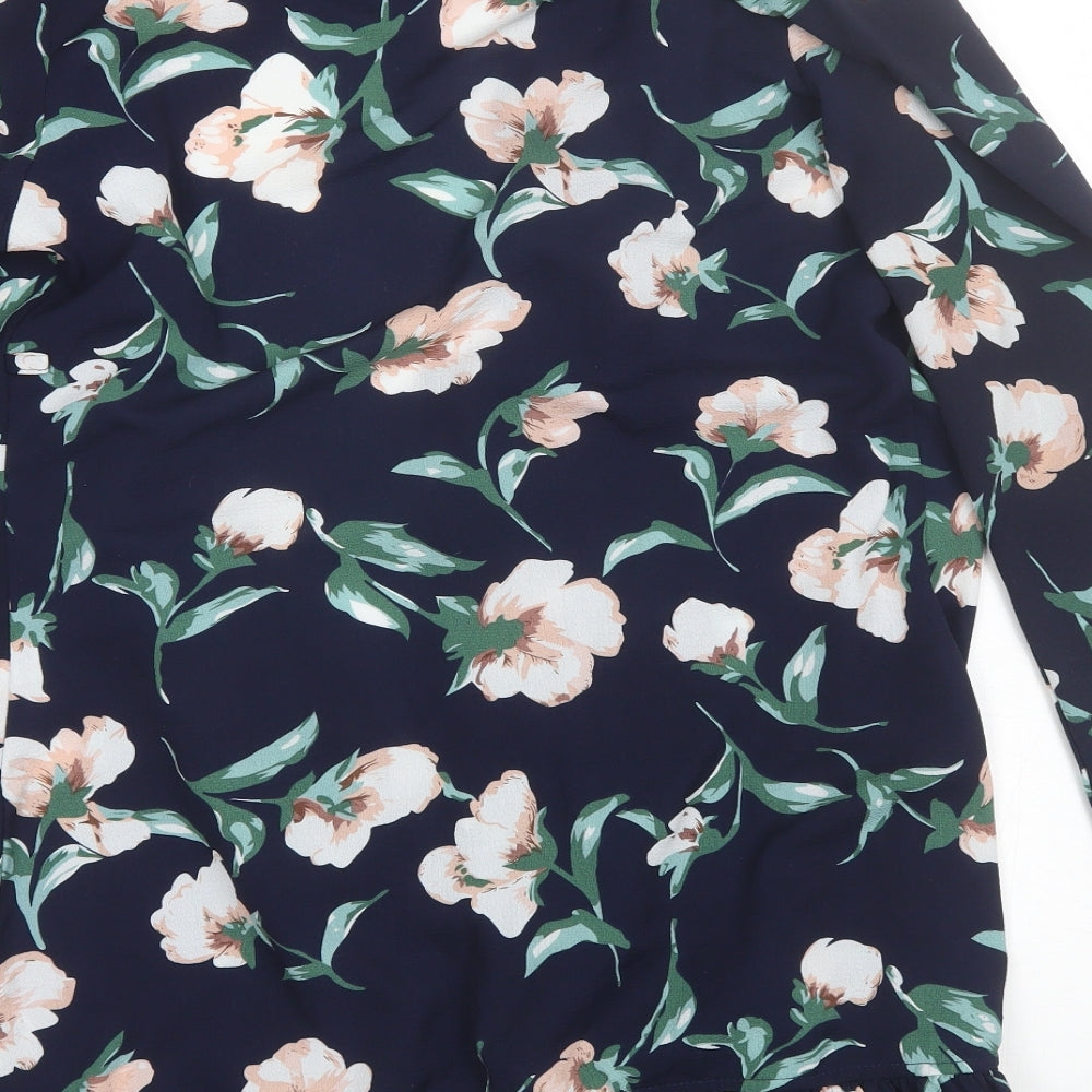 Brand and care label for Boohoo women’s blue collared floral polyester shrug jumper, size UK 10