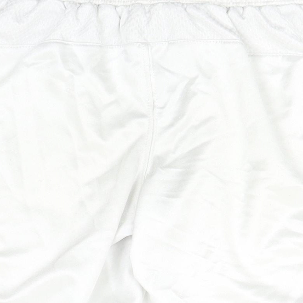 Brand and care label for Macron boys’ white polyester utility shorts