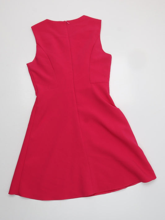 Back view of F&F women’s pink polyester fit & flare, size UK 12, round neck