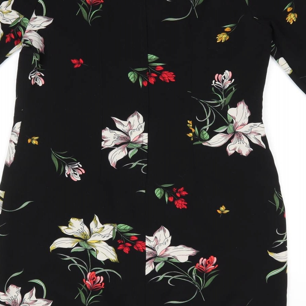 Brand and care label for Dorothy Perkins women’s black floral polyester a-line, round neck - back zip lightly gathered
