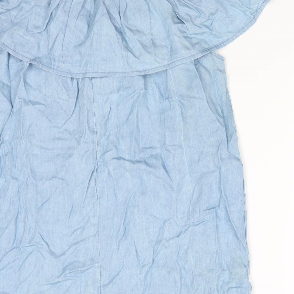 Brand and care label for Quiz women’s blue basic blouse, off the shoulder - pale blue top with frill elasticated shoulders