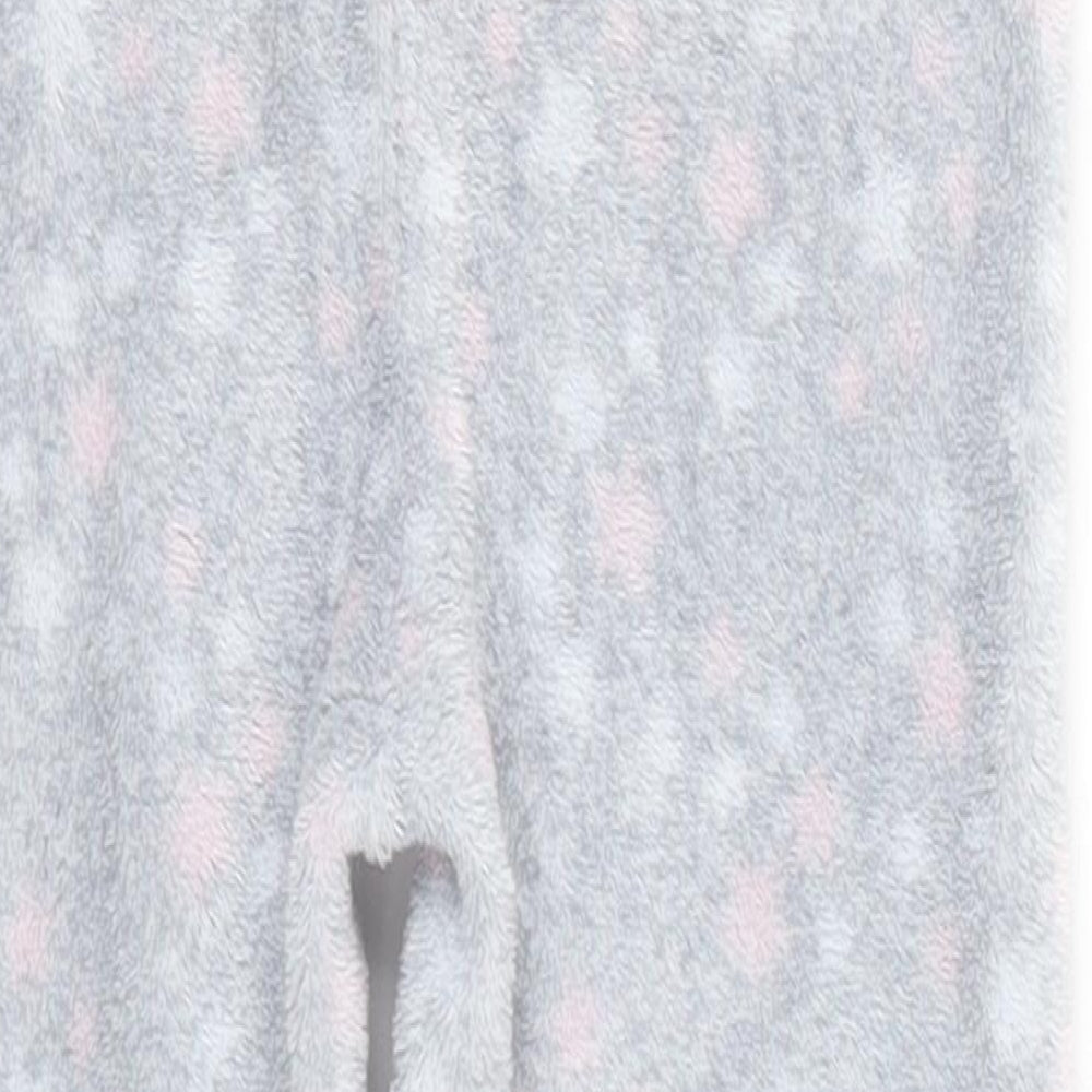 Brand and care label for Primark girls’ grey spotted polyester one piece, size 3-4, years