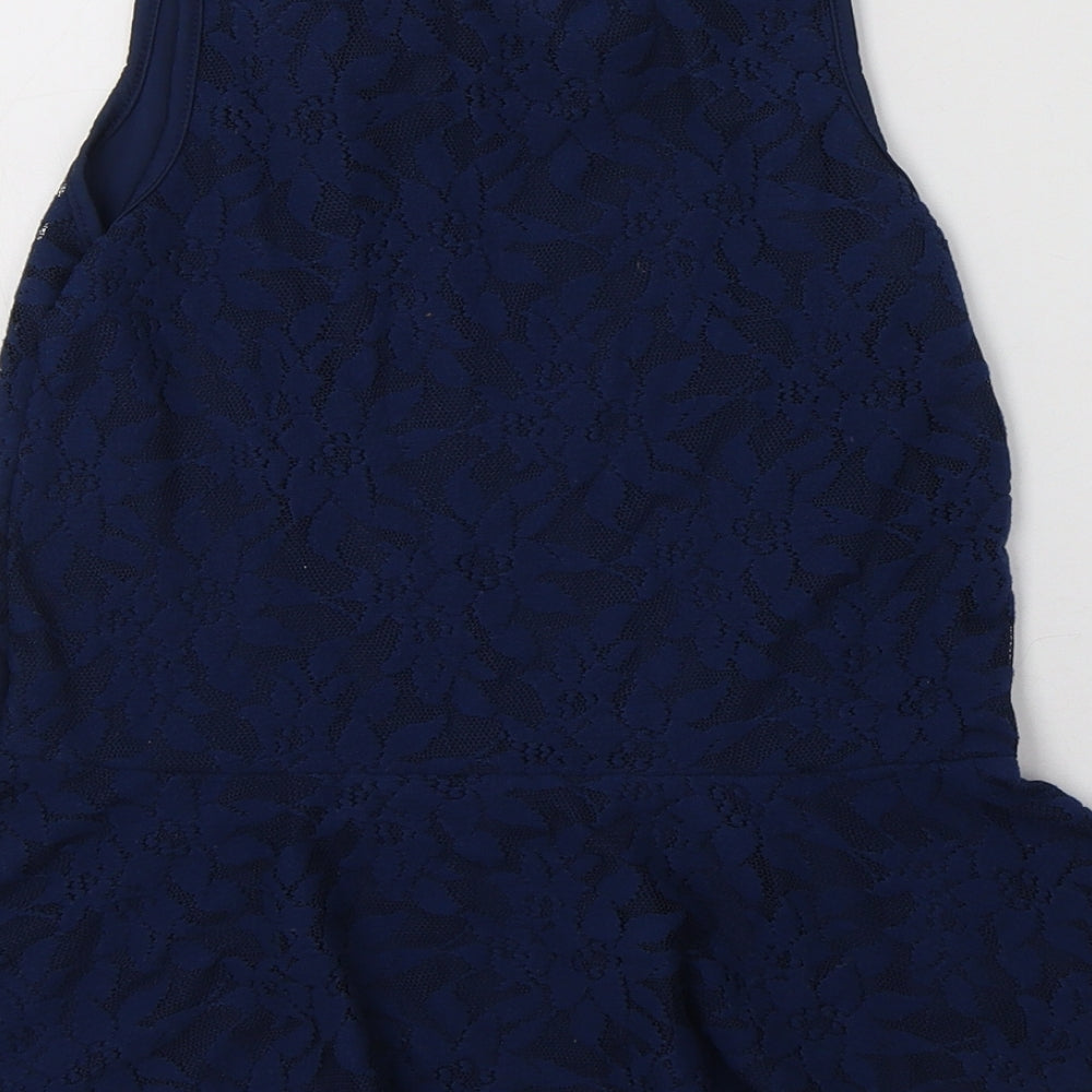 Brand and care label for George girls’ blue floral polyester basic blouse, size 10-11, years collared button - peplum