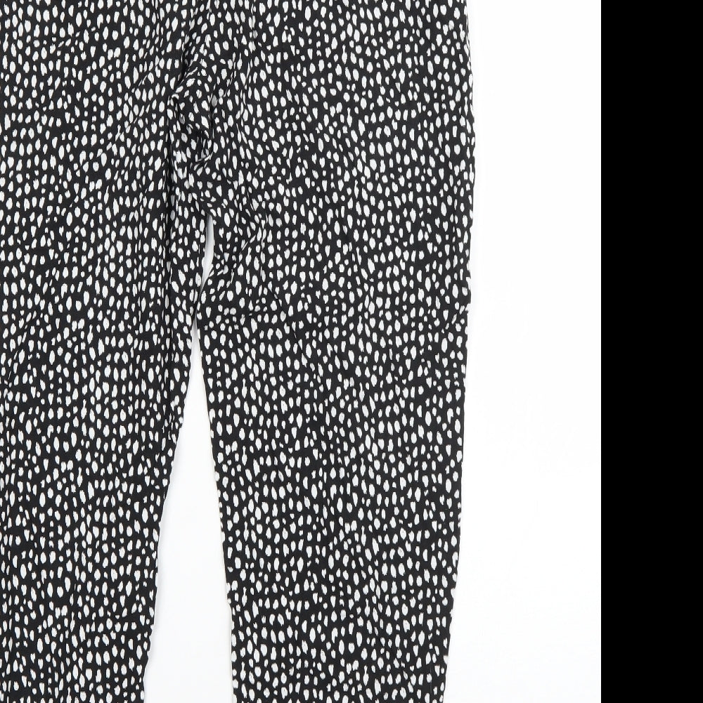 Brand and care label for Classics women’s black animal print viscose harem trousers, size UK 12, 25-inch leg regular