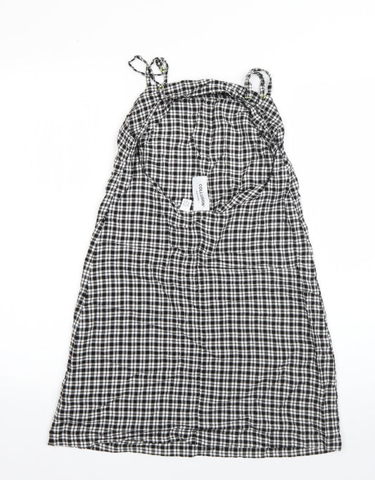 Back view of Collusion women’s black plaid viscose a-line, size UK 10, square neck