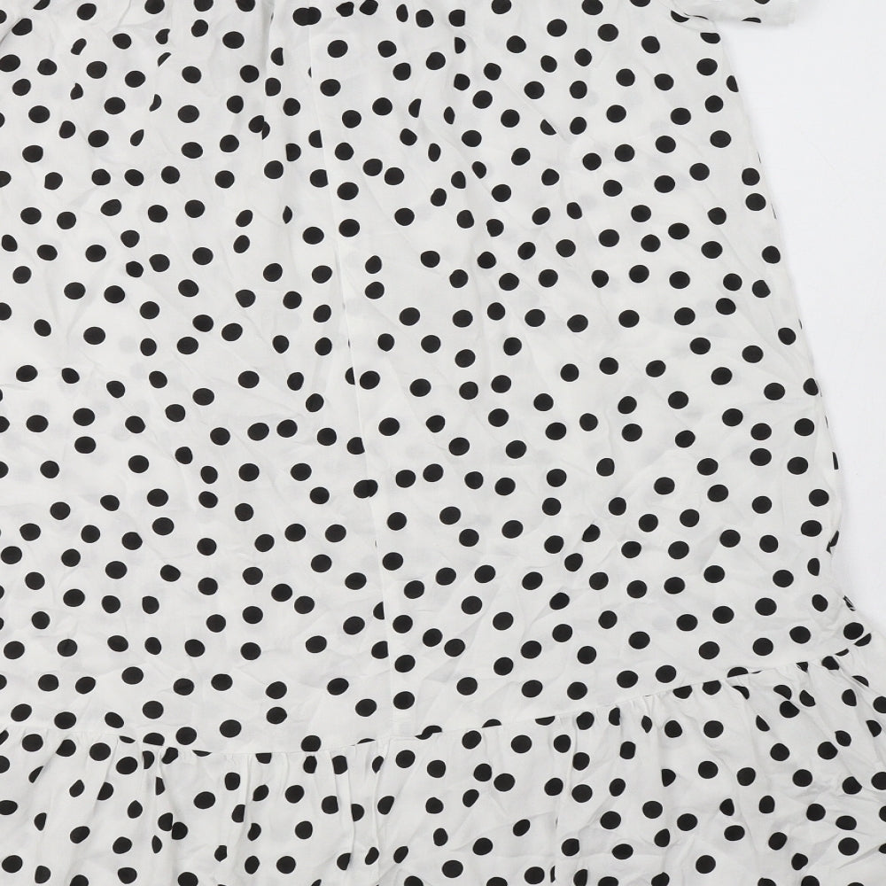Brand and care label for Papaya women’s white polka dot viscose a-line, size UK 8, off the shoulder