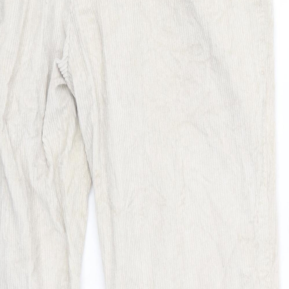 Brand and care label for Mason men’s ivory cotton trousers, size 34, in, 28-inch leg regular