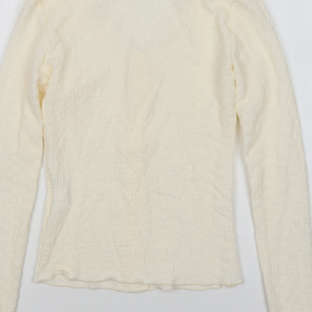 Brand and care label for SHEIN women’s beige round neck polyester cardigan jumper, size XS