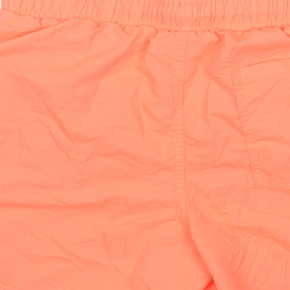 Brand and care label for Cedarwood State men’s orange polyester athletic shorts, size S, 6-inch leg regular