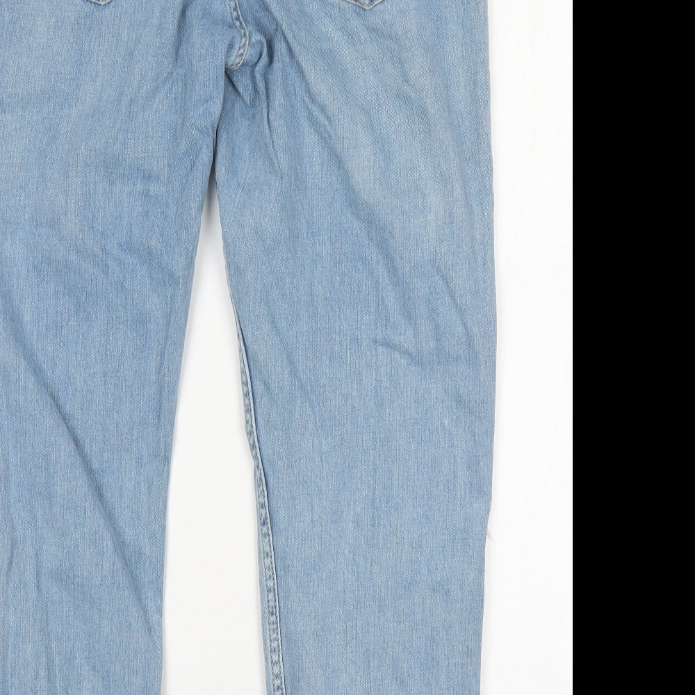 Brand and care label for Topshop women’s blue cotton mom jeans, size UK 32, in, 27-inch leg regular