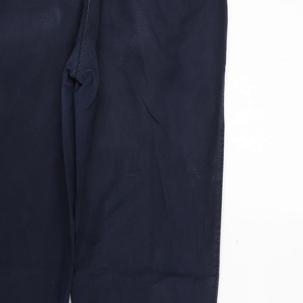 Brand and care label for Preworn men’s blue cotton trousers, 30-inch leg regular