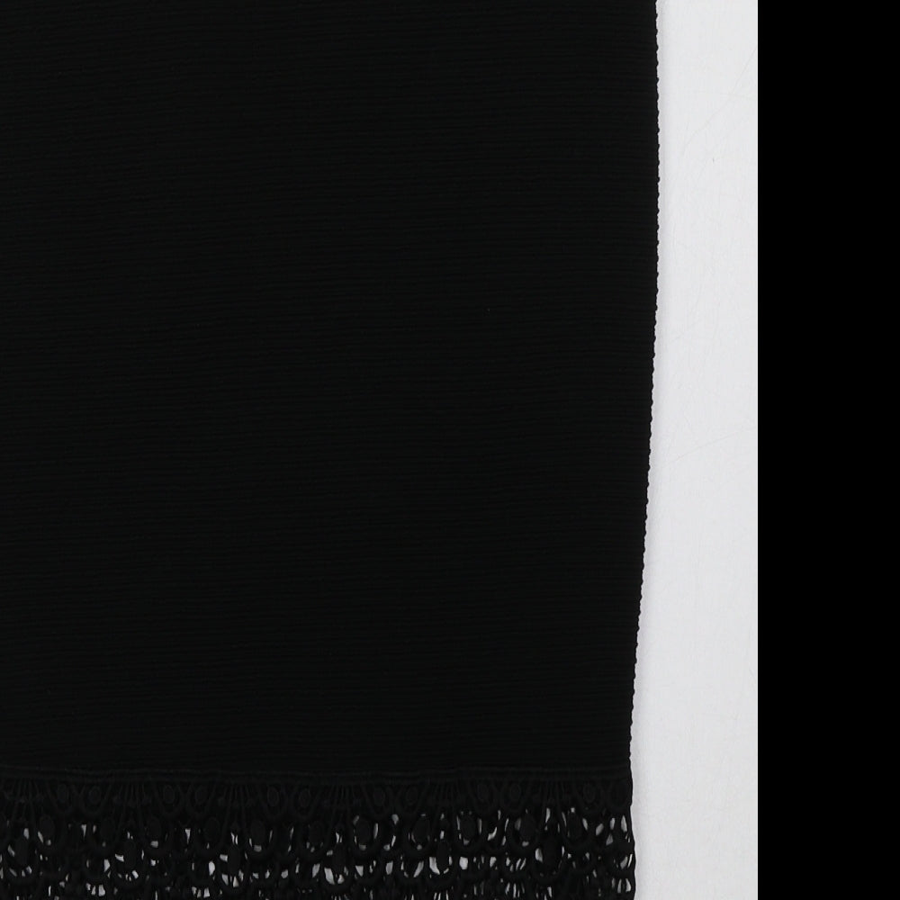 Brand and care label for Primark women’s black polyester a-line skirt, size UK 6, - lace detail at the bottom