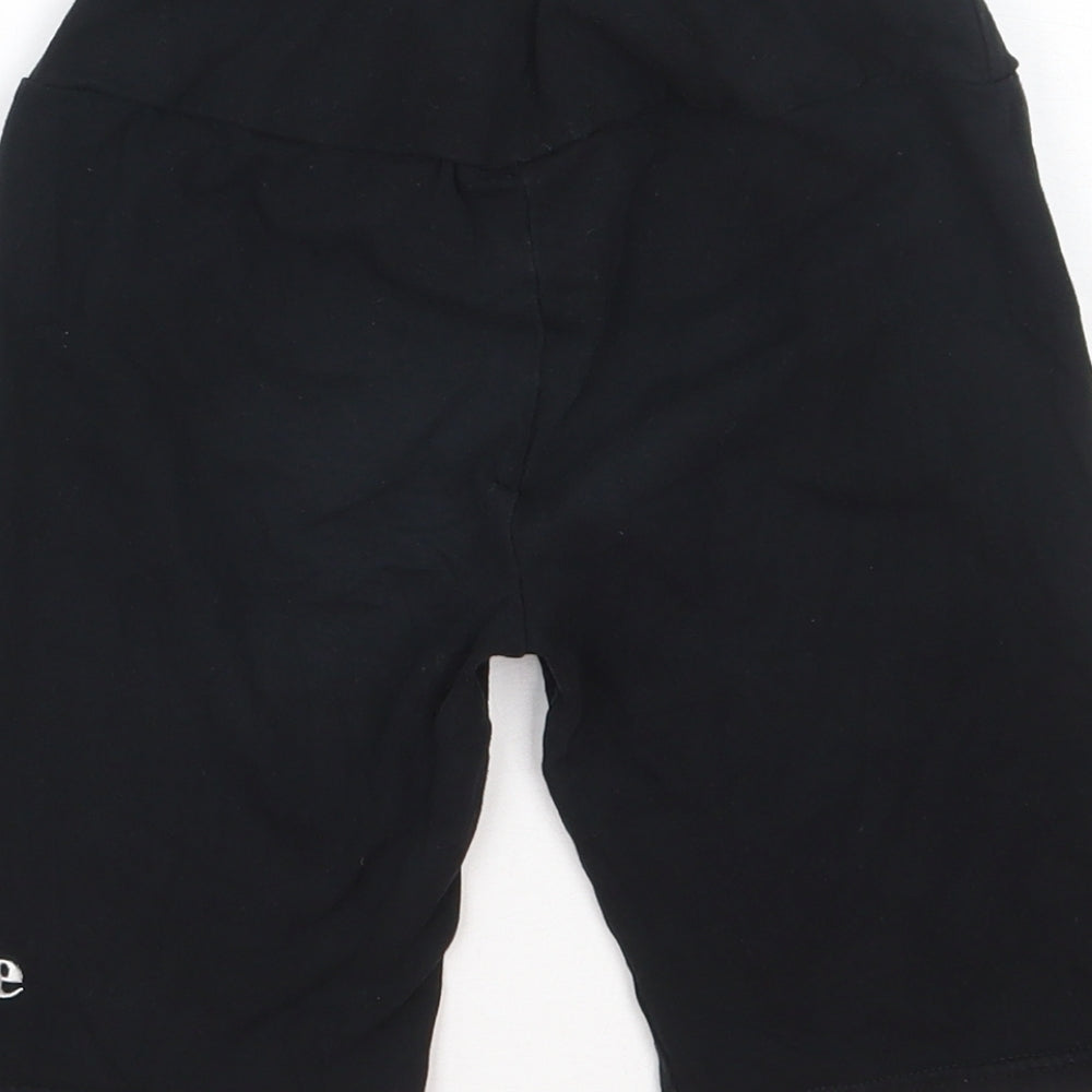 Brand and care label for Ellesse women’s black cotton biker shorts, size XS, 7-inch leg regular
