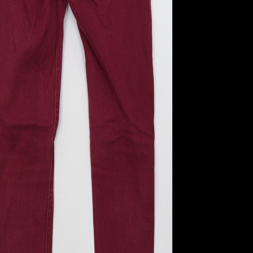 Brand and care label for Boohoo women’s purple cotton skinny jeans, size UK 8, 30-inch leg regular button