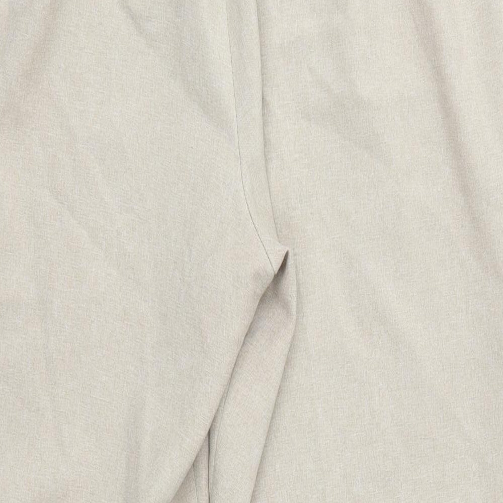 Brand and care label for Classics women’s beige polyester dress pants trousers, size UK 18, 27-inch leg regular