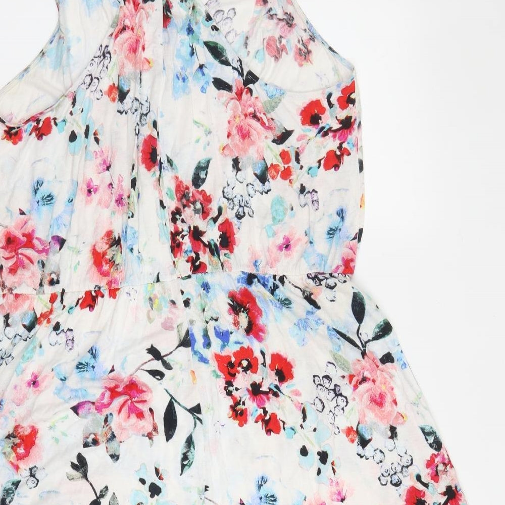 Brand and care label for H&M women’s white floral viscose a-line, size M, v-neck