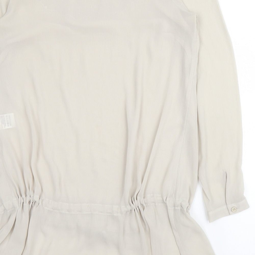 Brand and care label for Epilogue women’s beige polyester basic blouse, size UK 10, round neck