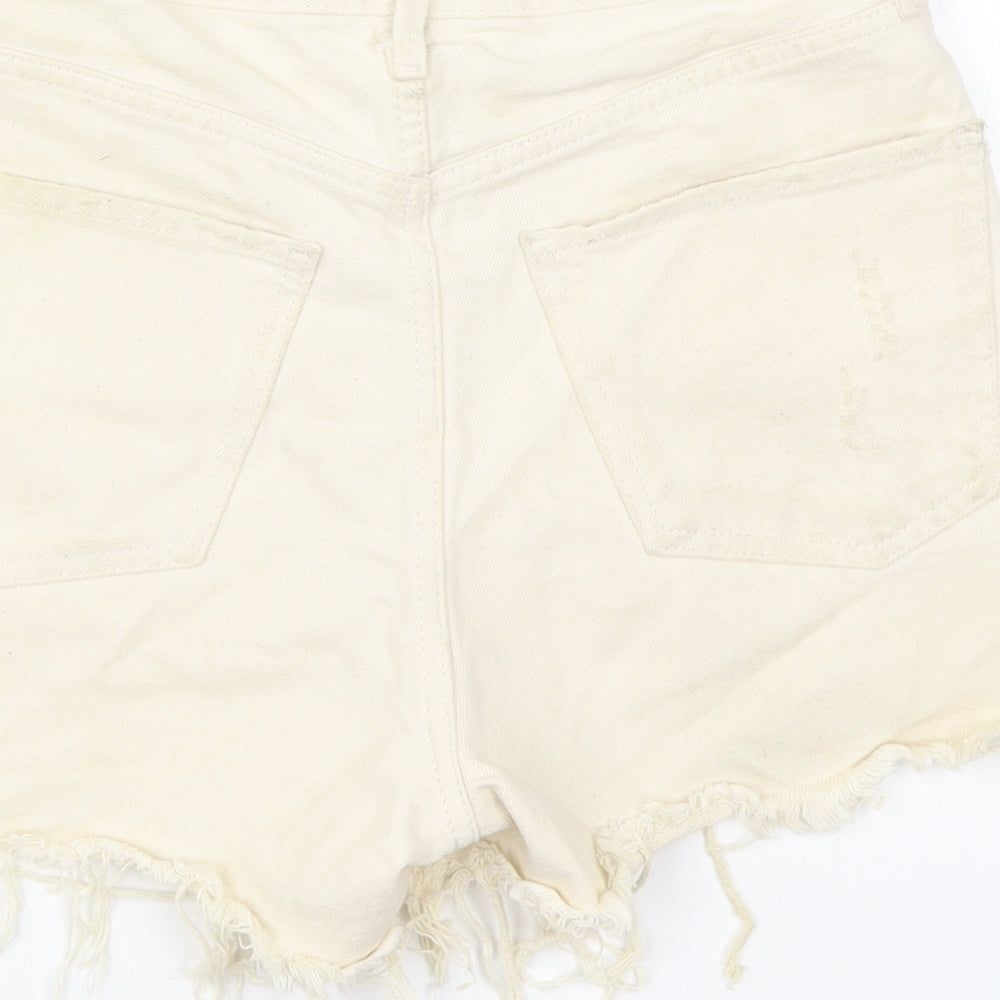 Brand and care label for Mango women’s beige cotton cut-off shorts, size UK 6, regular button