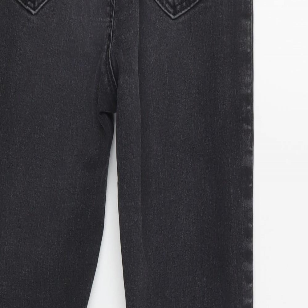 Brand and care label for Topshop women’s black cotton skinny jeans, size UK 28, 30-inch leg regular button
