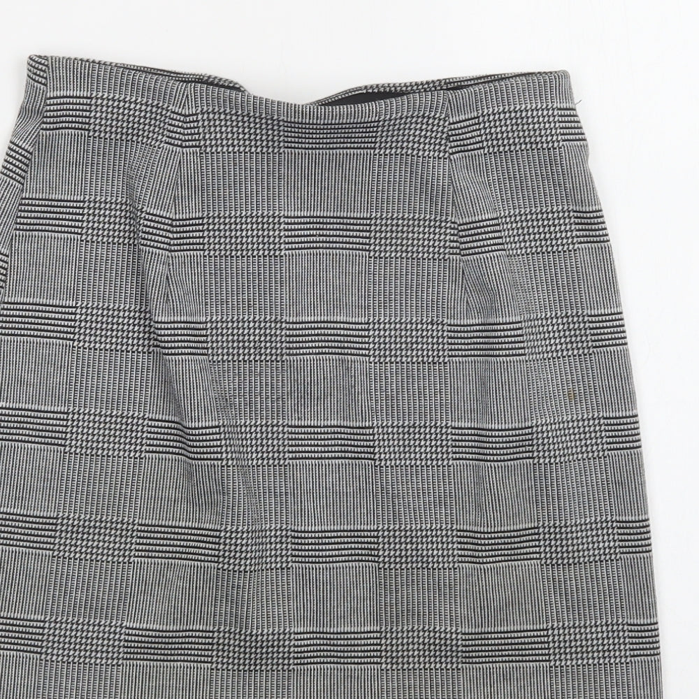Brand and care label for H&M women’s grey check polyester mini skirt, size XS