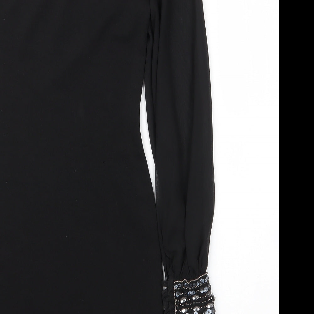 Brand and care label for Jane Norman women’s black cotton sheath, size UK 6, off the shoulder