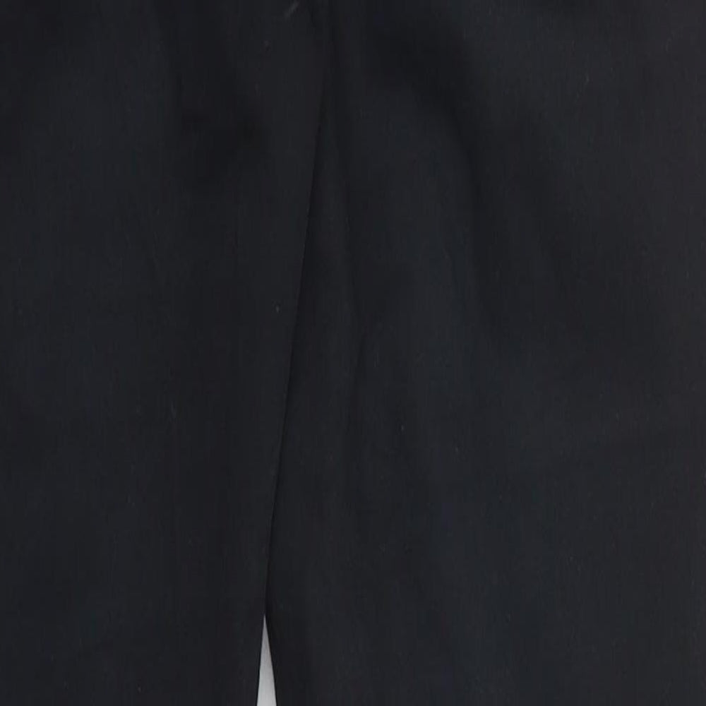 Brand and care label for Topshop women’s black cotton skinny jeans, size UK 26, in, 27-inch leg regular button