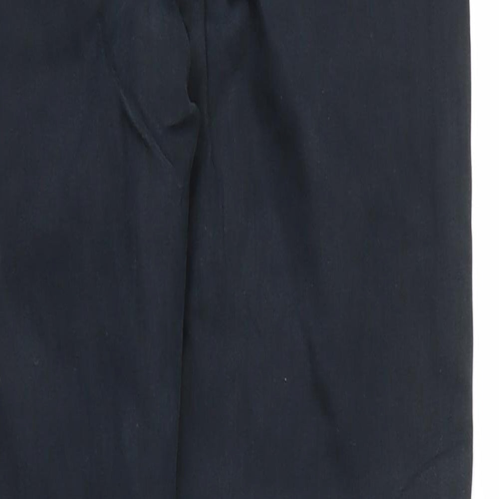 Brand and care label for Topshop women’s black cotton skinny jeans, size UK 28, in, 27-inch leg regular zip