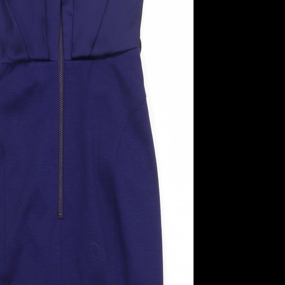 Brand and care label for Next women’s purple polyester a-line, size UK 6, crew neck zip