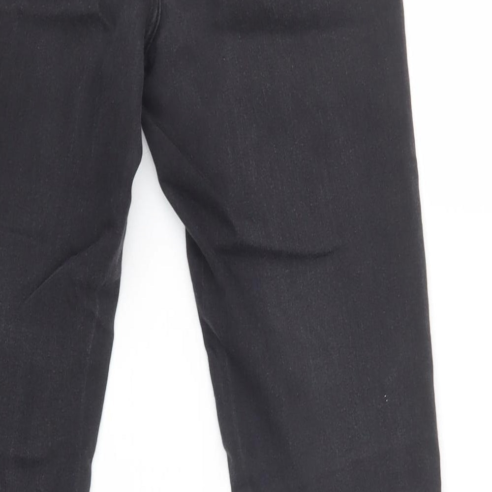 Brand and care label for Primark women’s black cotton skinny jeans, size UK 8, 30-inch leg regular button
