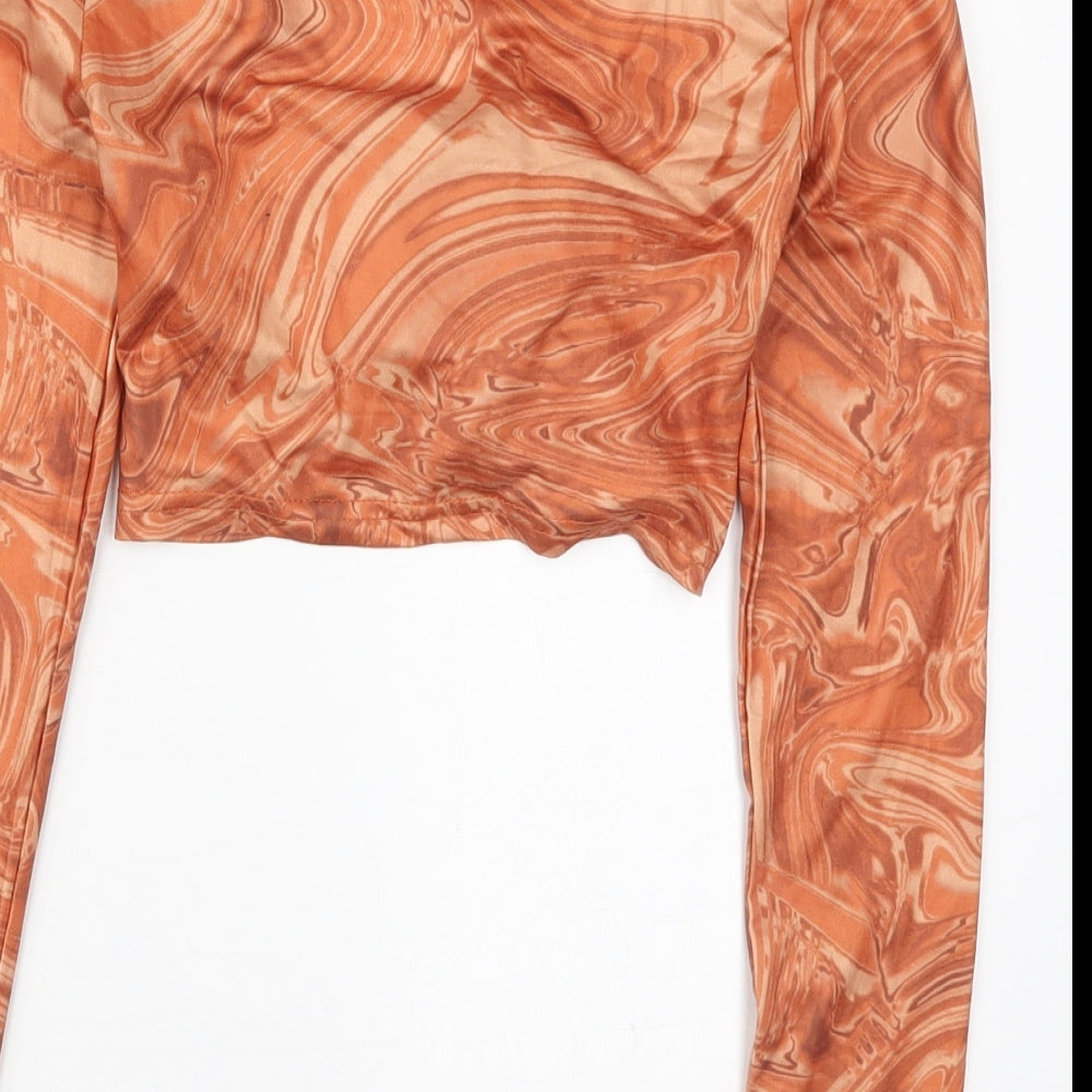 Brand and care label for SHEIN women’s orange polyester cropped t-shirt, size S, off the shoulder - abstract