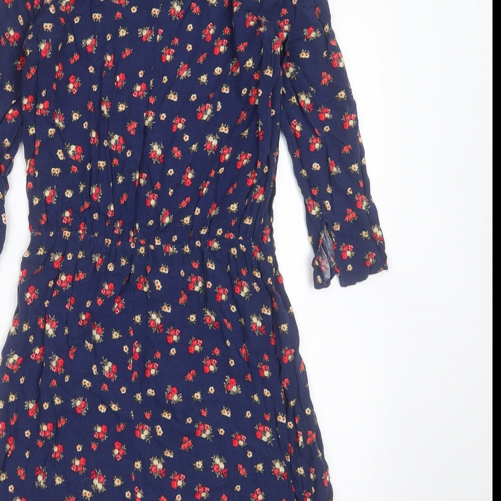 Brand and care label for Divided by H&M women’s blue floral viscose fit & flare, size UK 6, round neck