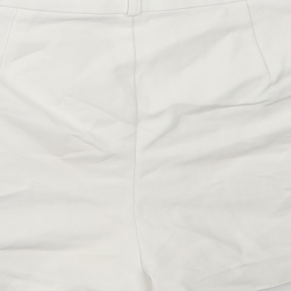 Brand and care label for Stradivarius women’s white cotton hot pants shorts, size UK 34, regular