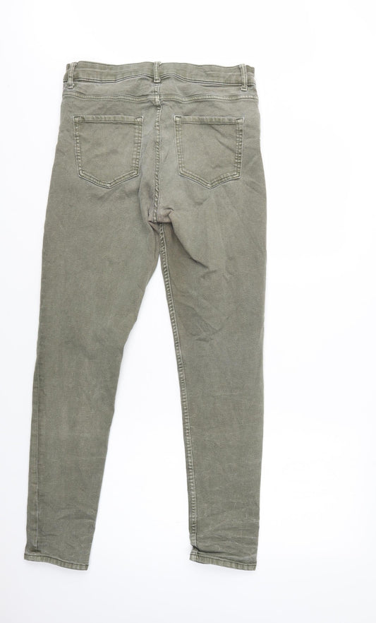 Back view of Marks & Spencer women’s green cotton skinny jeans, size UK 12, 31-inch leg regular button