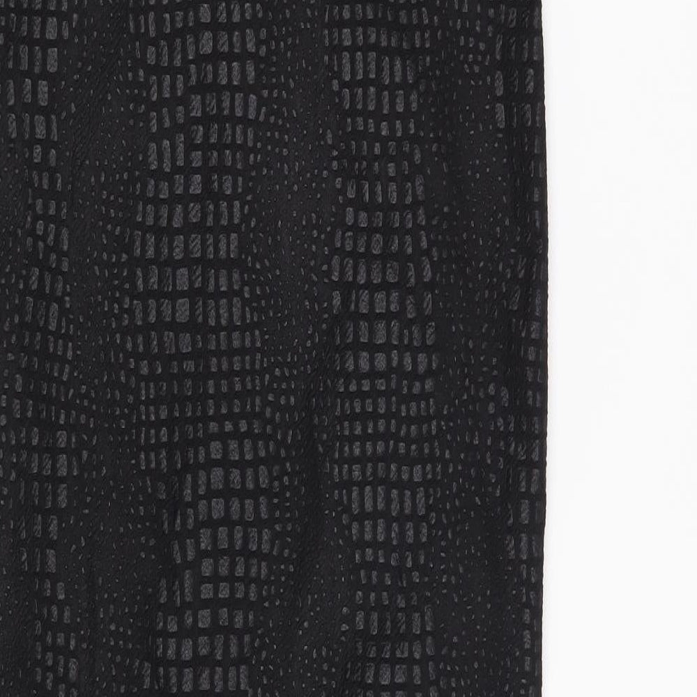 Brand and care label for PRETTYLITTLETHING women’s black animal print polyester straight & pencil skirt, size UK 8