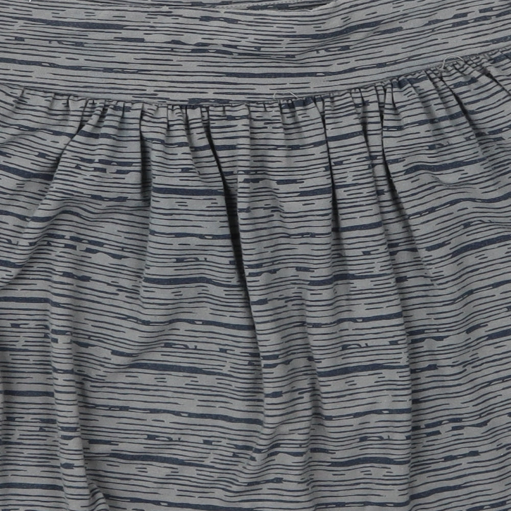 Brand and care label for Gap women’s grey striped polyester a-line skirt, size S