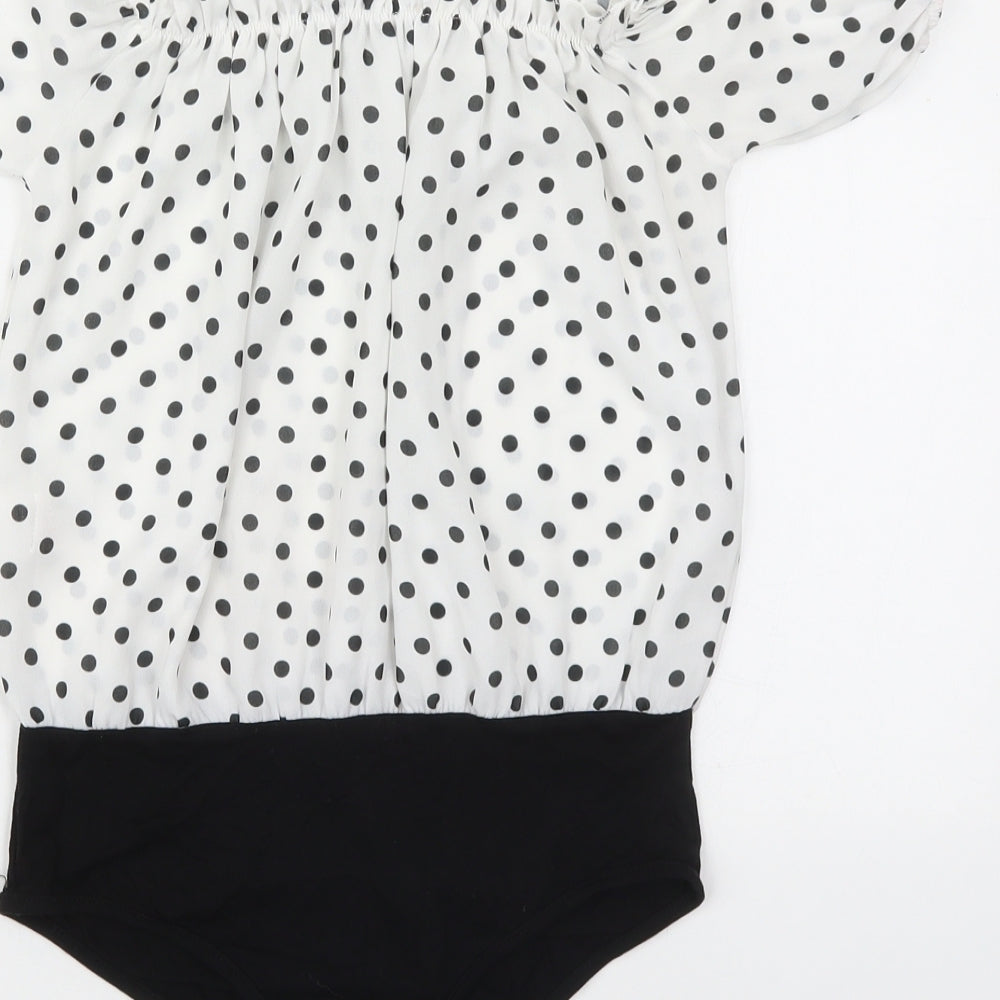 Brand and care label for Boohoo women’s white polka dot polyester bodysuit one-piece, size UK 6, pullover - black and white