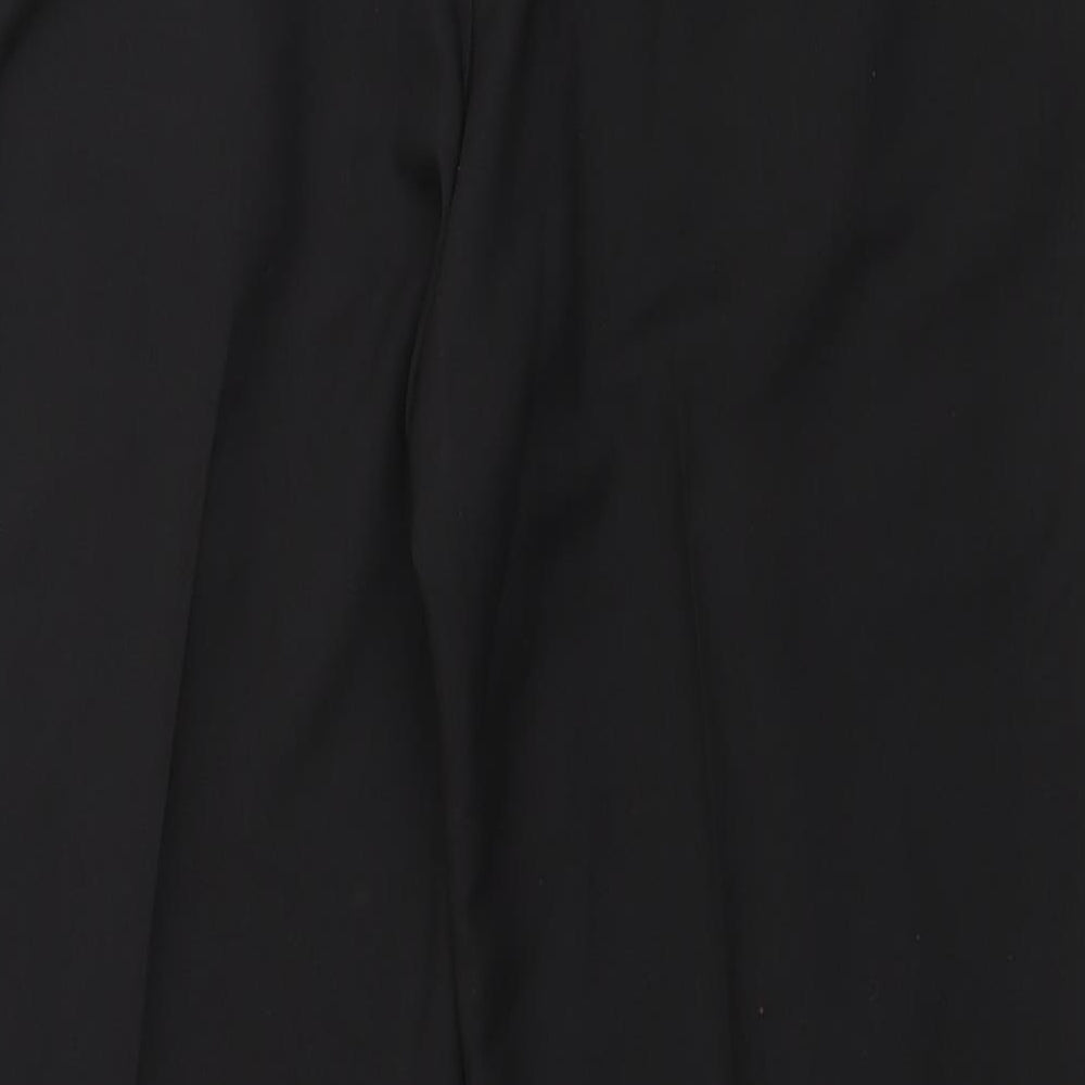 Brand and care label for Haggar men’s black polyester trousers, size 38, in, 30-inch leg regular zip