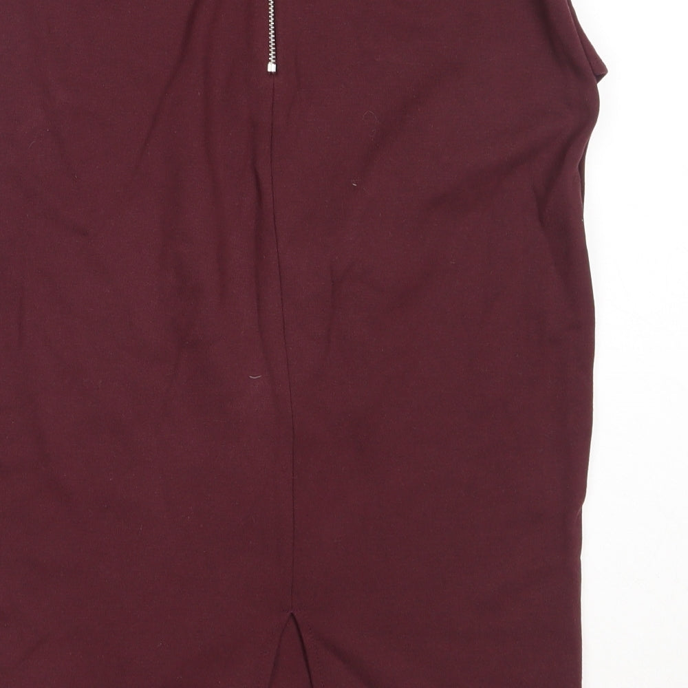 Brand and care label for Marks & Spencer women’s purple viscose straight & pencil skirt, size UK 10