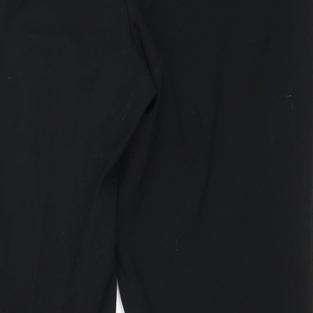 Brand and care label for Marks & Spencer women’s black polyester trousers, size UK 12, 28.5-inch leg regular