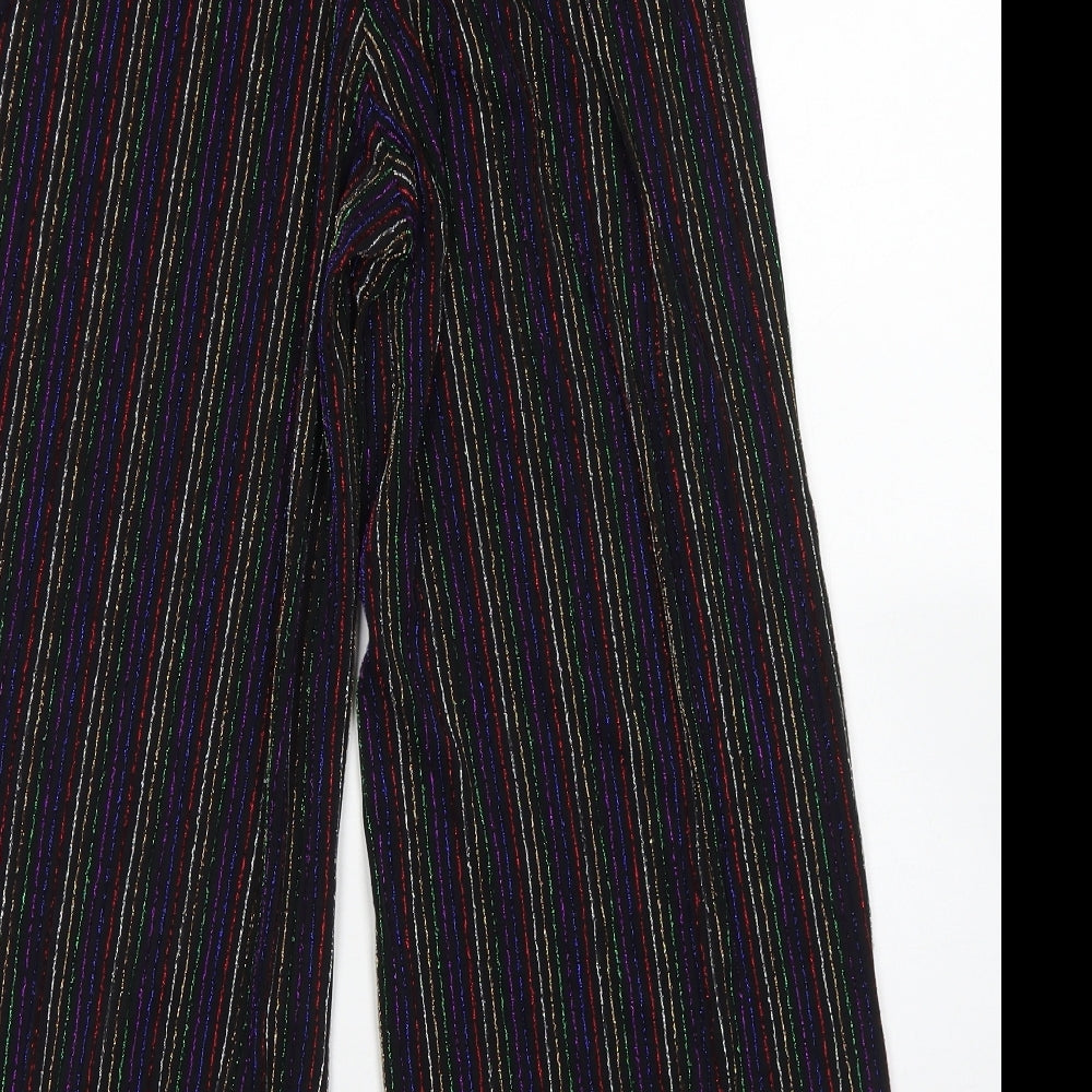 Brand and care label for Primark women’s black striped nylon dress pants trousers, size UK 4, 21-inch leg regular