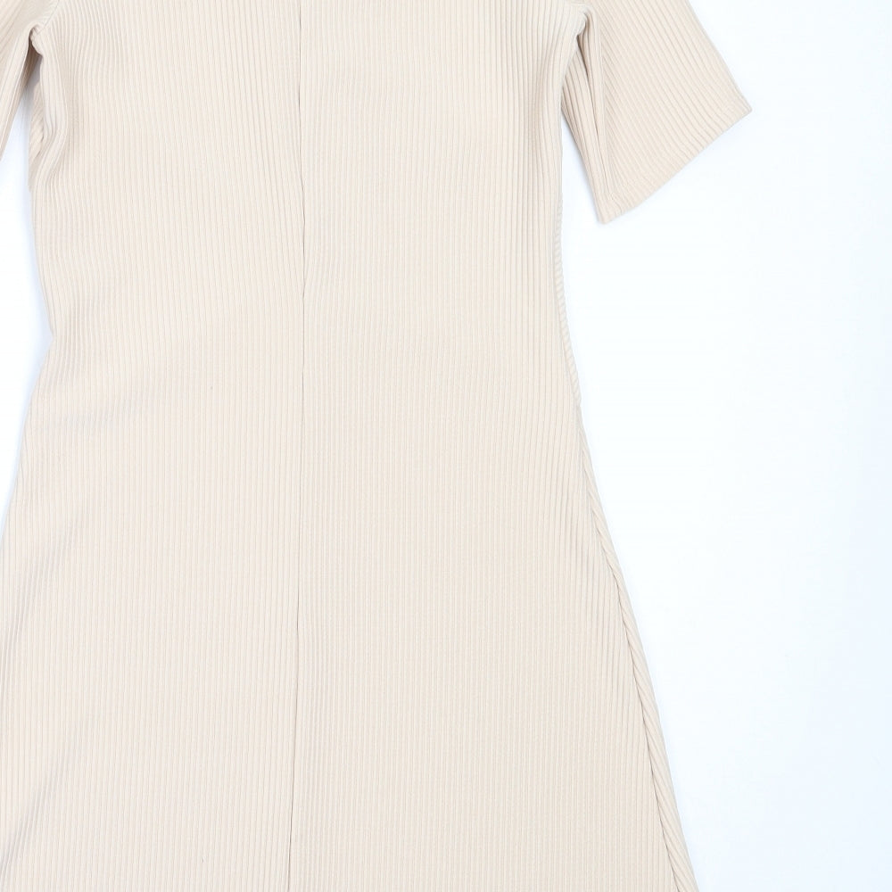 Brand and care label for Miss Selfridge women’s beige polyester fit & flare, size UK 8, high neck